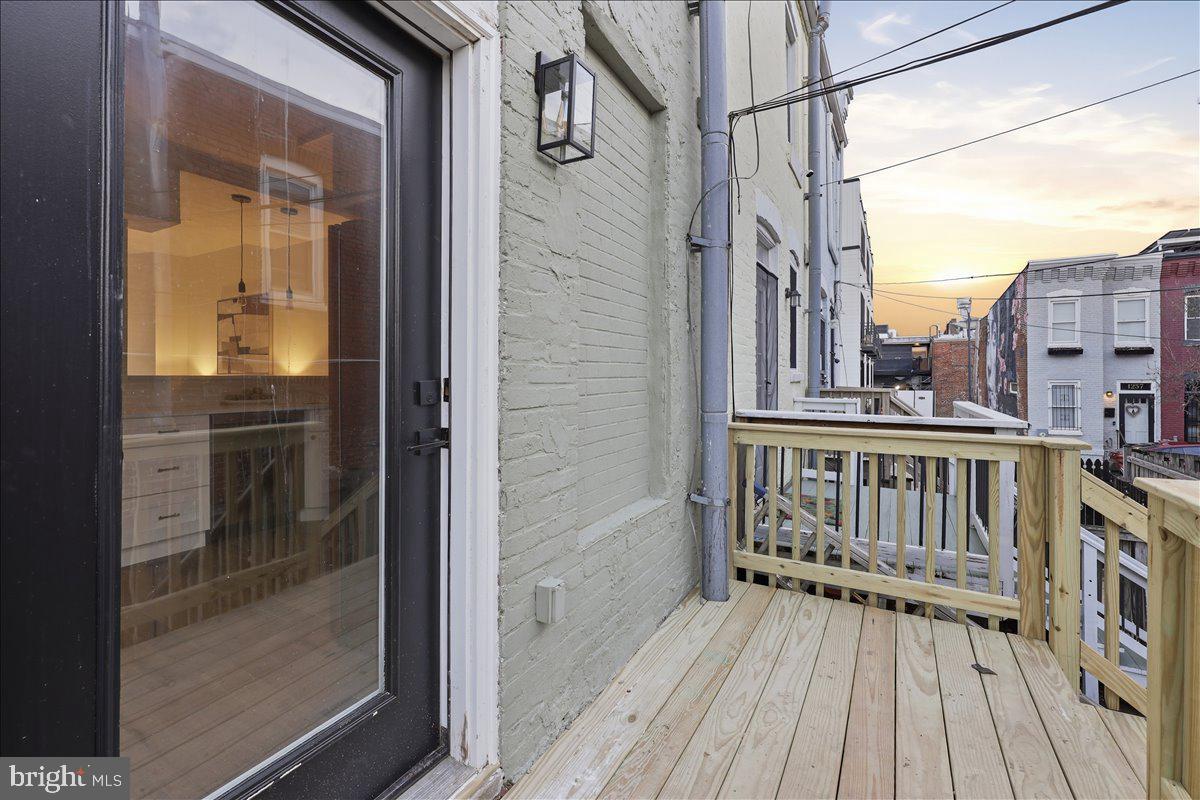 820 13th Street Northeast Washington, DC 20002 - Photo 9 of 38 a view of balcony with wooden floor