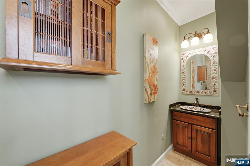 385 Berkeley Avenue Bloomfield, NJ 07003 - Photo 29 of 39 a view of a livingroom with wooden floor and a window