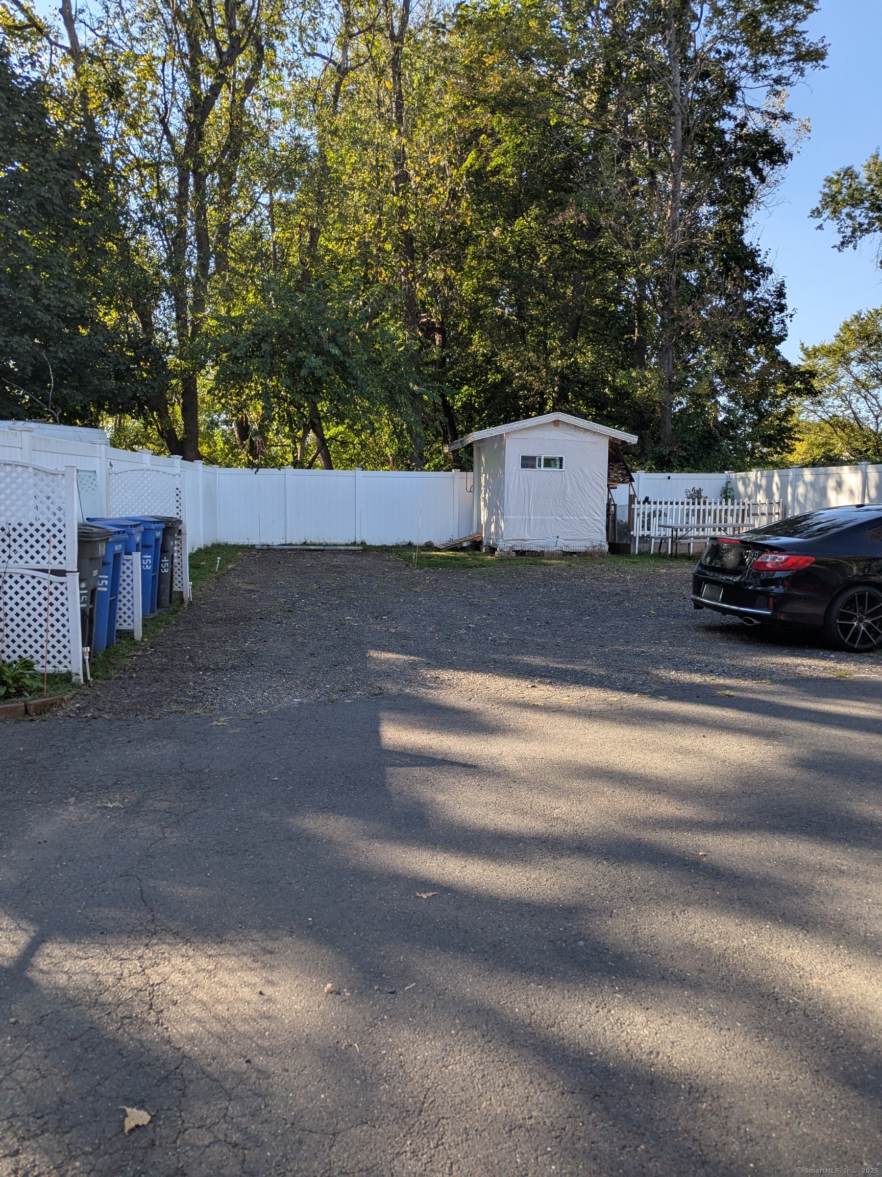 151 Enfield Street Hartford, CT 06112 - Photo 2 of 35 a view of a car in front of a house