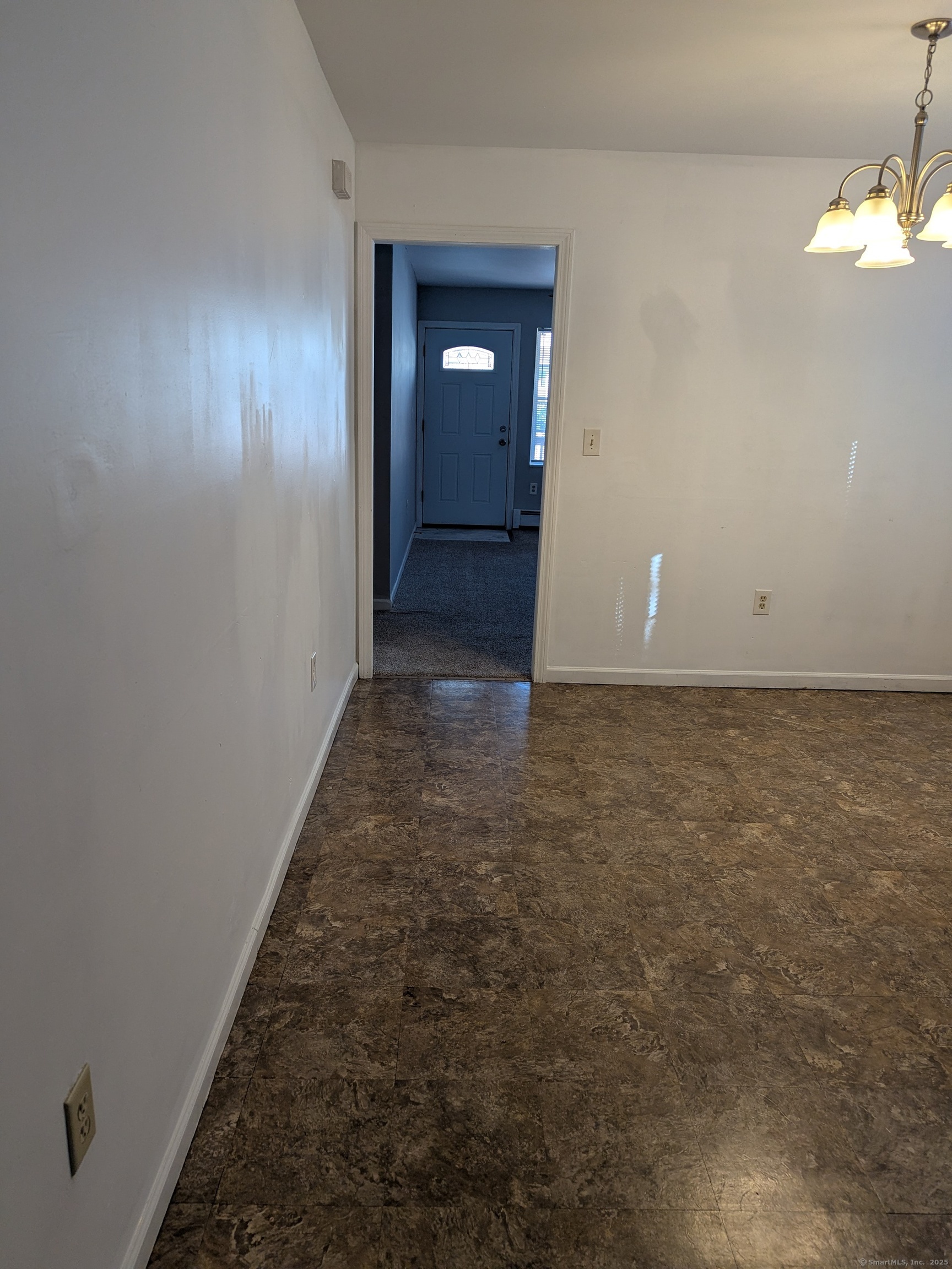 151 Enfield Street Hartford, CT 06112 - Photo 32 of 35 wooden floor in an empty room with a mirror