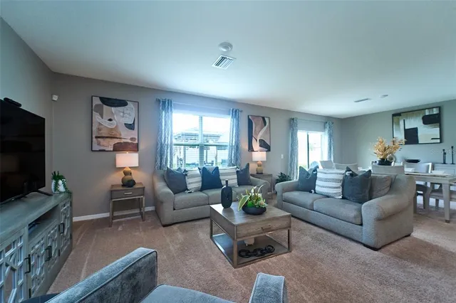 a view of a dining room with furniture