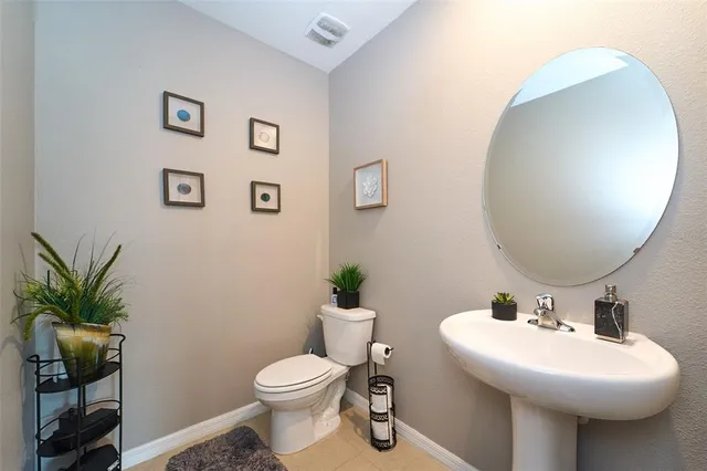 a workspace with furniture and a lamp