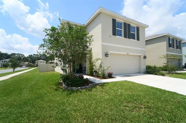 a house view with a garden space