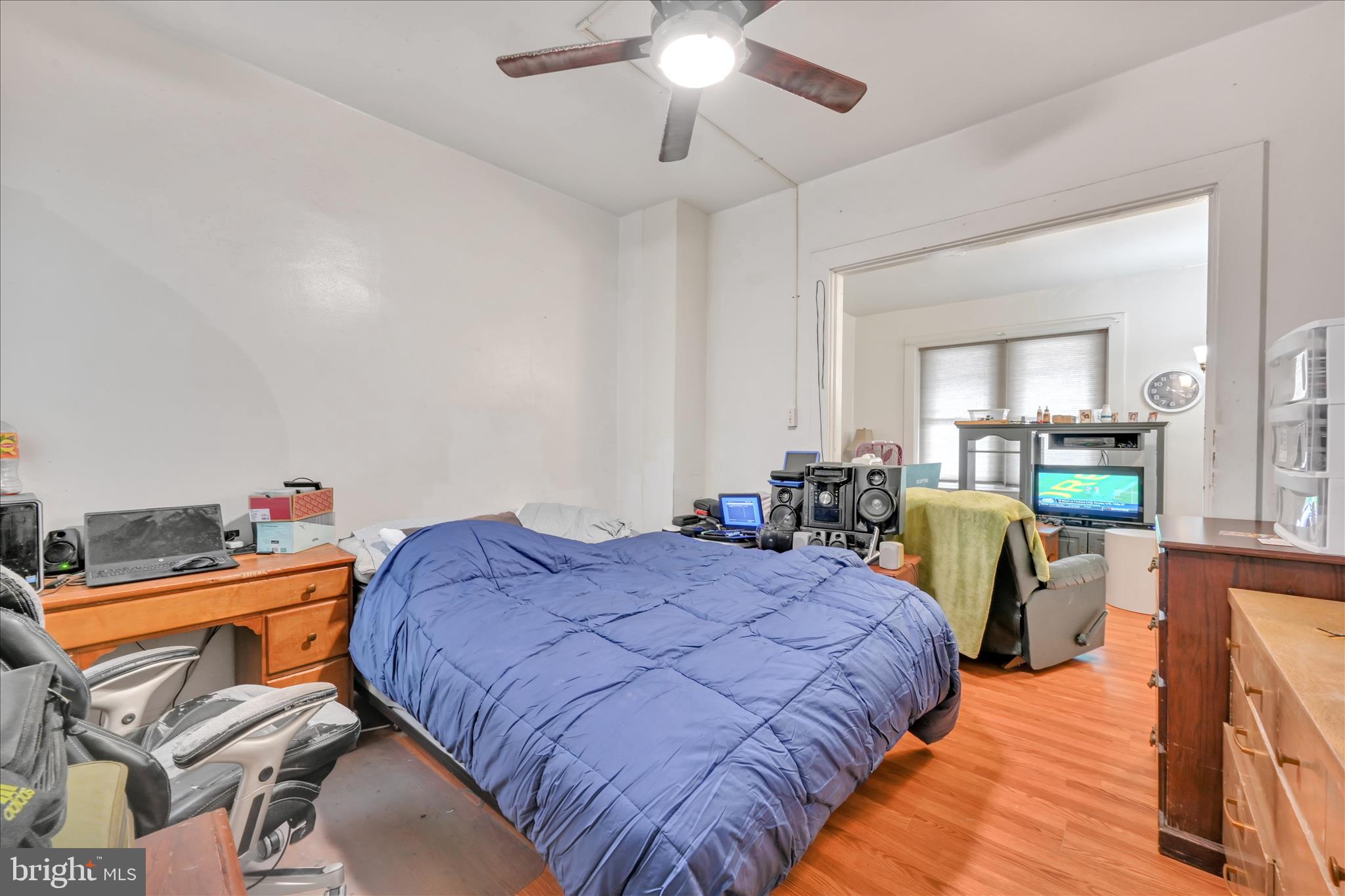 153 North Broad Street Lancaster, PA 17602 - Photo 21 of 38 a bed room with a bed and a chair