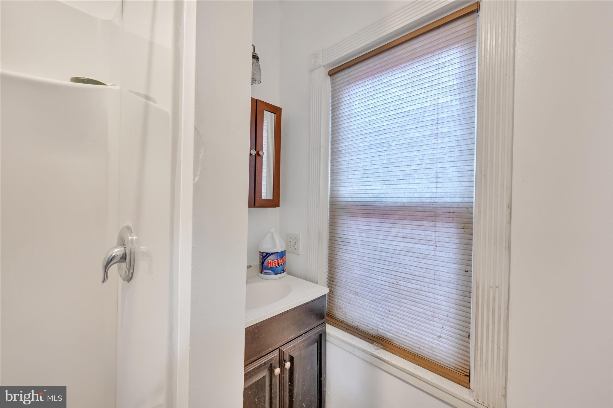 153 North Broad Street Lancaster, PA 17602 - Photo 29 of 38 a bathroom with a shower and a sink