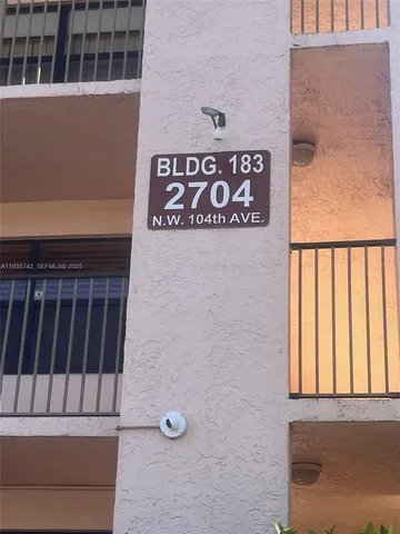 a view of balcony with wooden floor and stairs