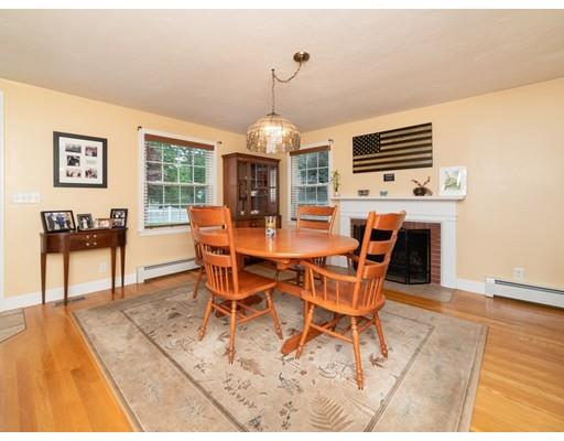 6 Longfellow Road Natick, MA 01760 - Photo 4 of 29 a dining room with furniture a chandelier and wooden floor