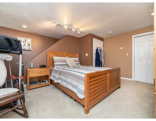 6 Longfellow Road Natick, MA 01760 - Photo 9 of 29 a bedroom with a bed and a television