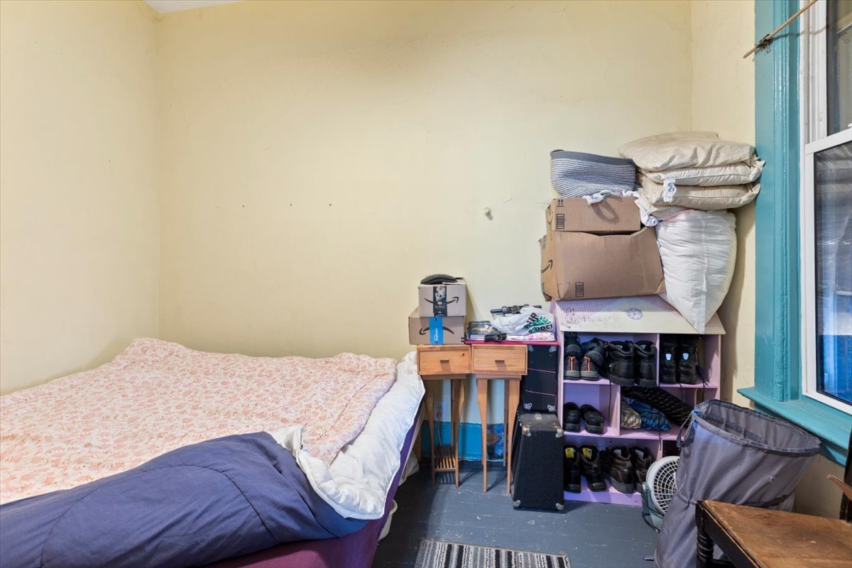 2605 West Division Street Chicago, IL 60622 - Photo 15 of 28 a bed room with a bed and a wine table