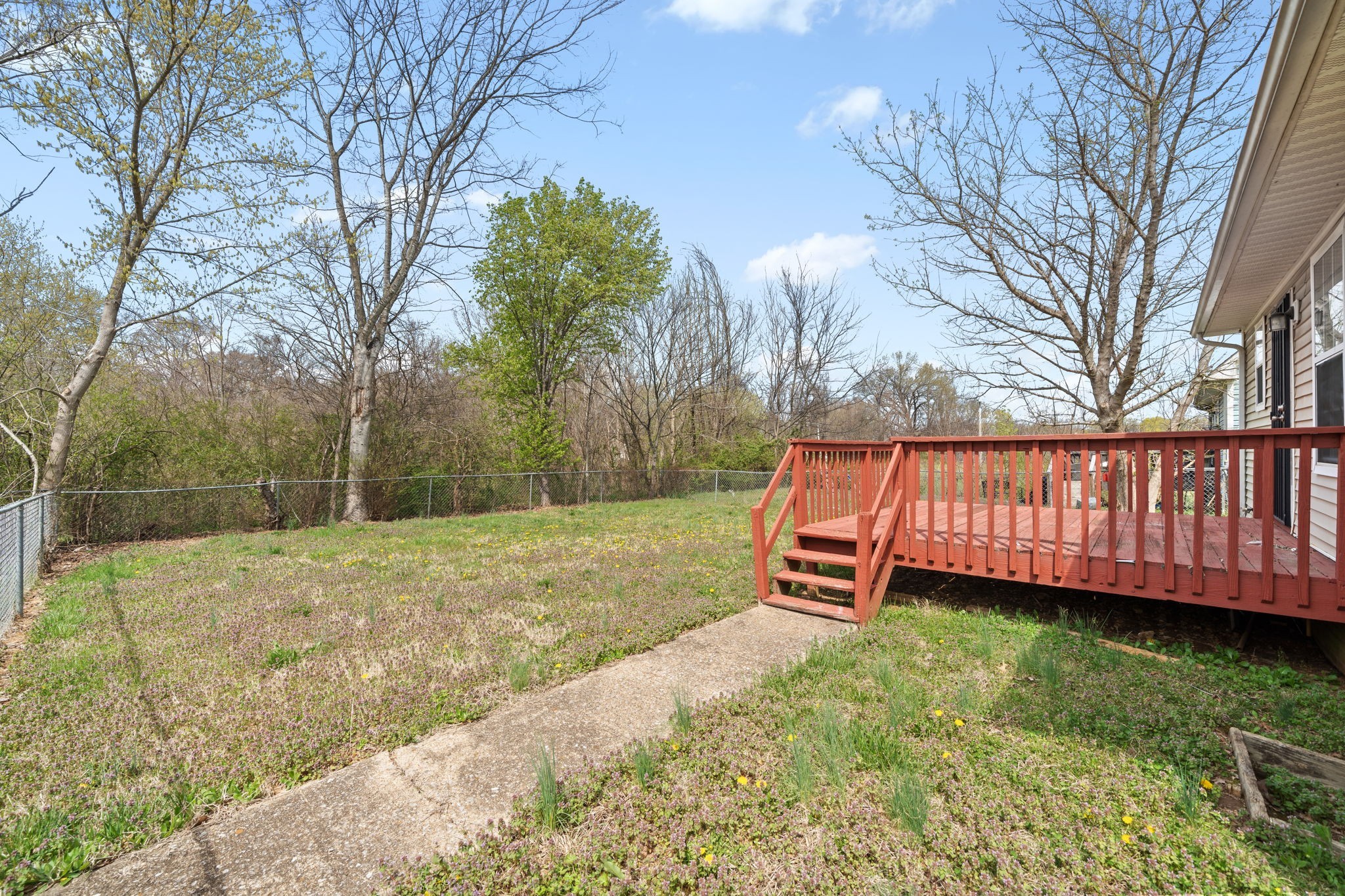 9193 Pembroke Oak Grove Road Oak Grove, KY 42262 - Photo 17 of 18 a backyard of a house with wooden floor and fence