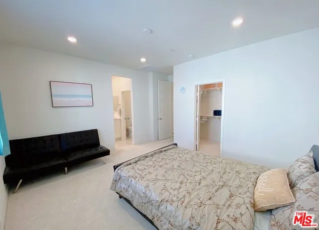 a bathroom with a double vanity sink mirror and shower