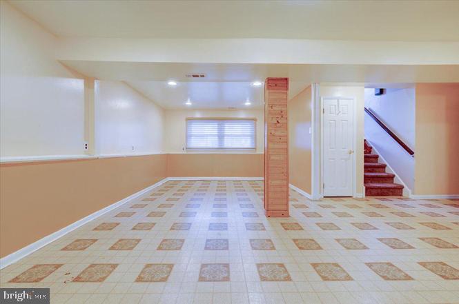 219 Fairview Avenue Lawnside, NJ 08045 - Photo 15 of 21 a view of a hallway with wooden floor and a living room