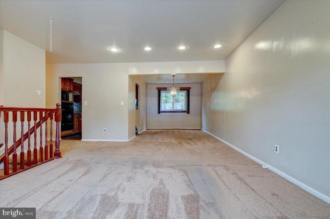 219 Fairview Avenue Lawnside, NJ 08045 - Photo 5 of 21 a view of an empty room and window