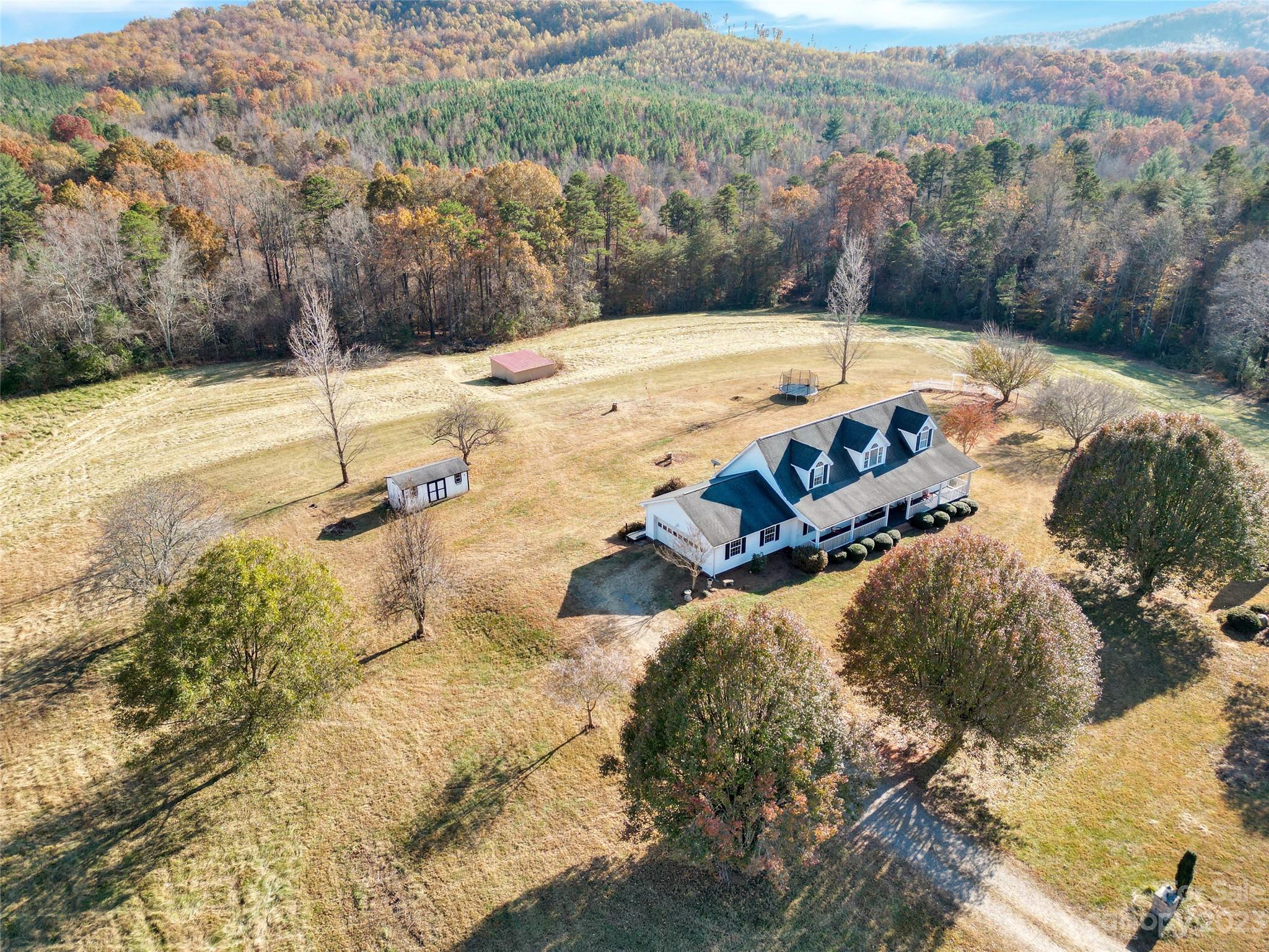 307 Rupard Road Statesville, NC 28625 - Photo 5 of 36 a view of a backyard with a lake
