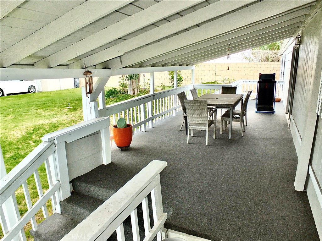 2601 East Victoria Street, Unit 439 Rancho Dominguez, CA 90220 - Photo 12 of 32 a view of a dining room with furniture window and outside view