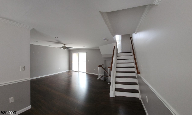 532 Great Beds Court, Unit 532 Perth Amboy, NJ 08861 - Photo 1 of 13 a view of entryway and hall with wooden floor