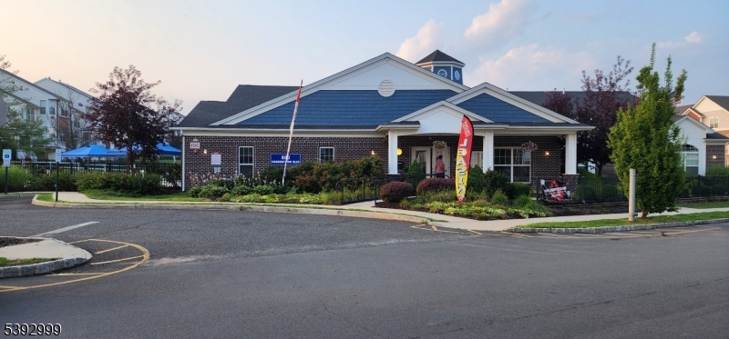 532 Great Beds Court, Unit 532 Perth Amboy, NJ 08861 - Photo 12 of 13 a front view of a house with a garden