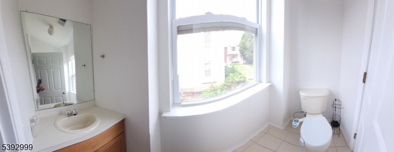 532 Great Beds Court, Unit 532 Perth Amboy, NJ 08861 - Photo 4 of 13 a bathroom with a sink toilet and shower