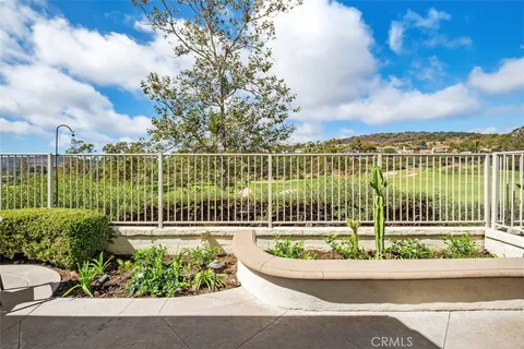a view of hallway with bathroom