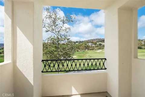 a view of a golf course with a lake