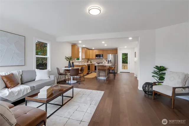a living room with furniture and a table