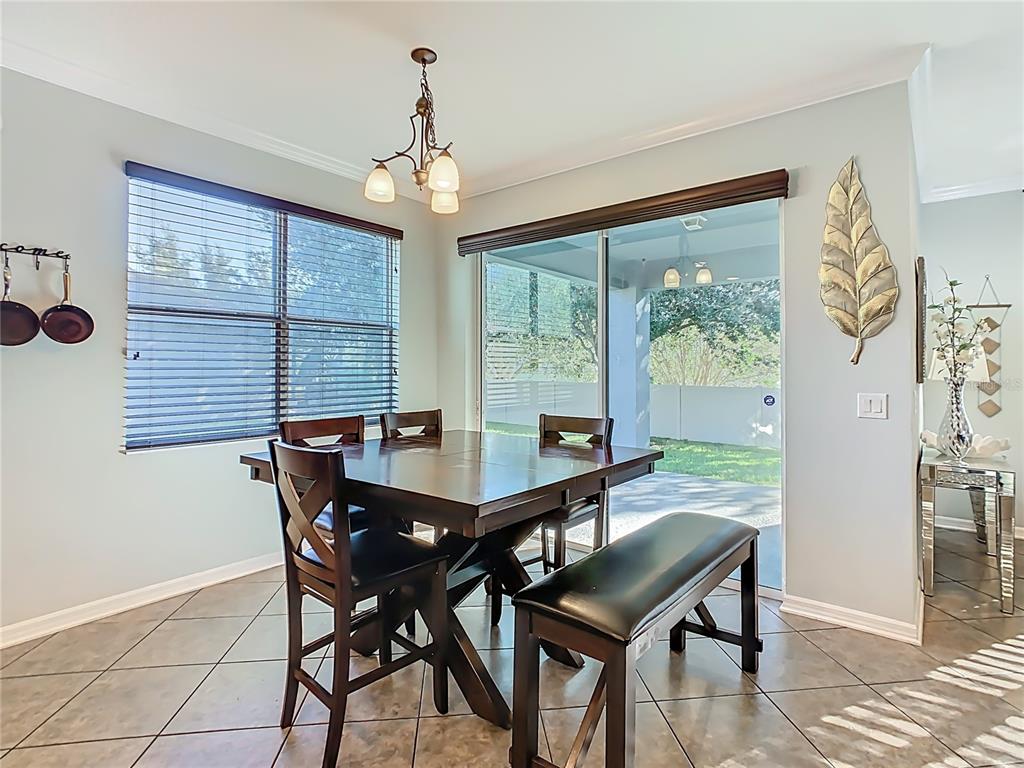 168 Magneta Loop Auburndale, FL 33823 - Photo 16 of 75 a view of a dining room with furniture window and outside view