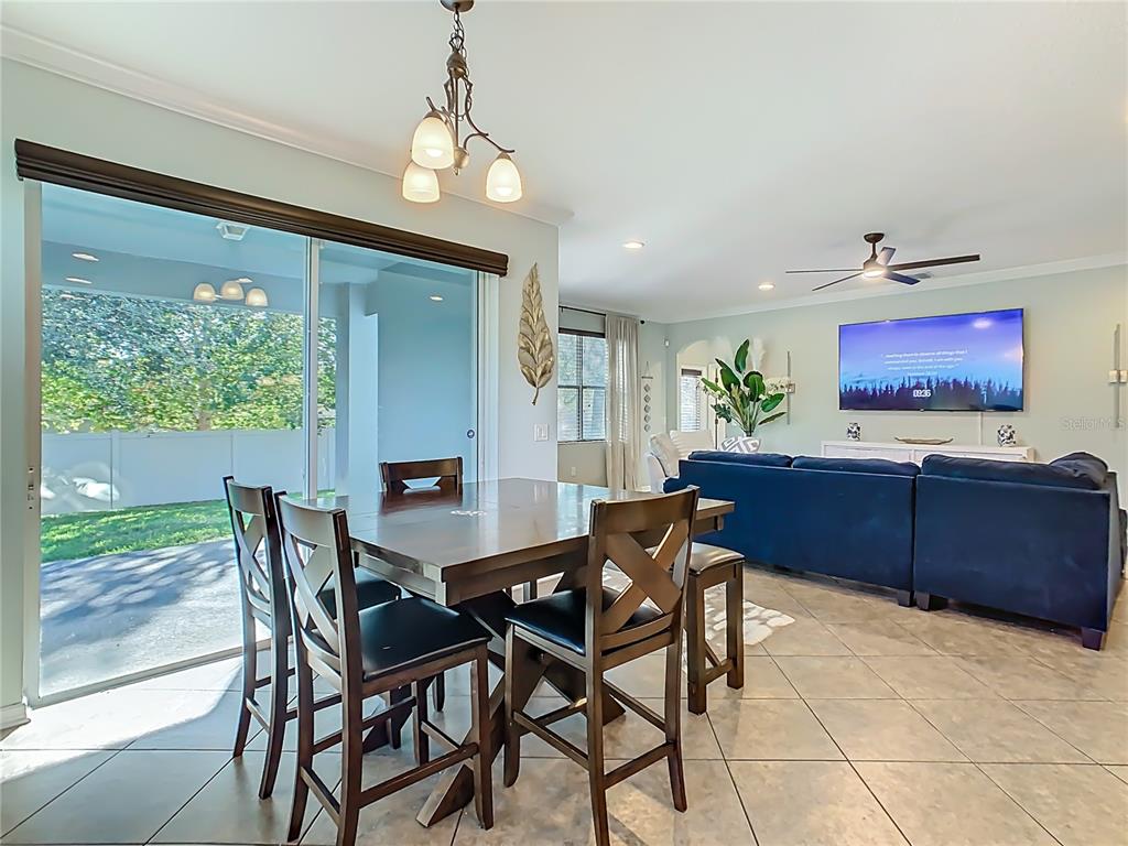 168 Magneta Loop Auburndale, FL 33823 - Photo 17 of 75 a view of a dining room with furniture window and outside view