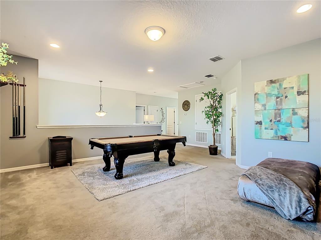 168 Magneta Loop Auburndale, FL 33823 - Photo 23 of 75 a living room with furniture and a table