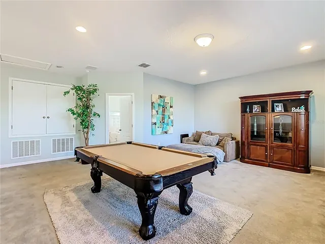 a bedroom with a bed and furniture