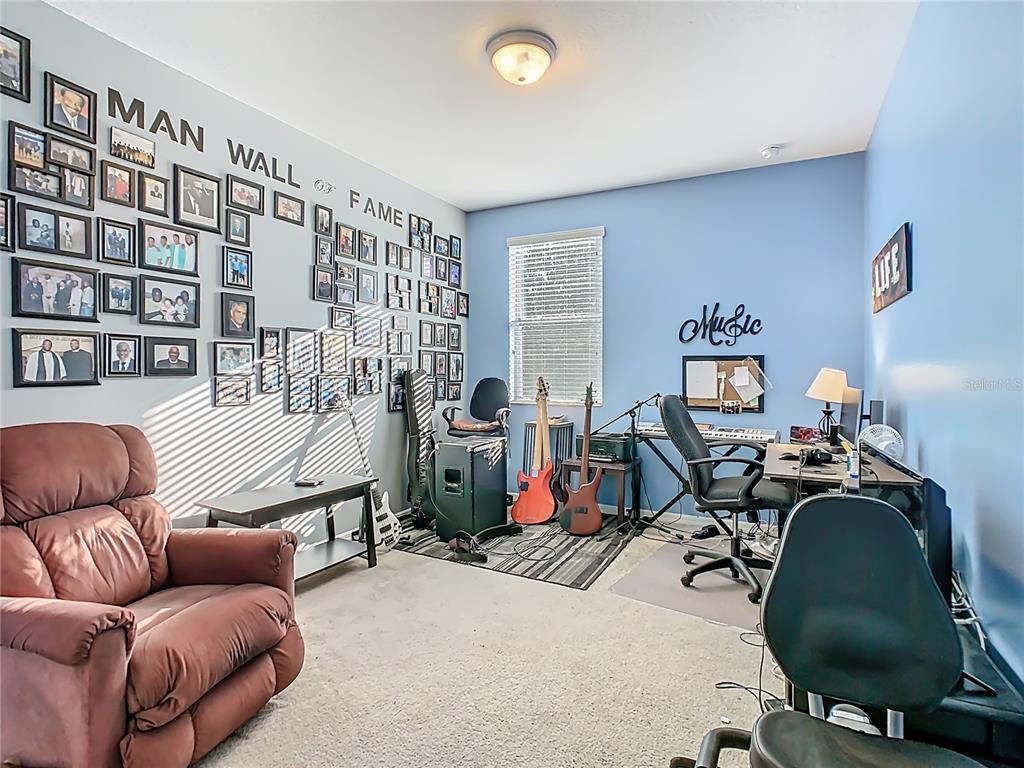 168 Magneta Loop Auburndale, FL 33823 - Photo 35 of 75 a bedroom with furniture and a window