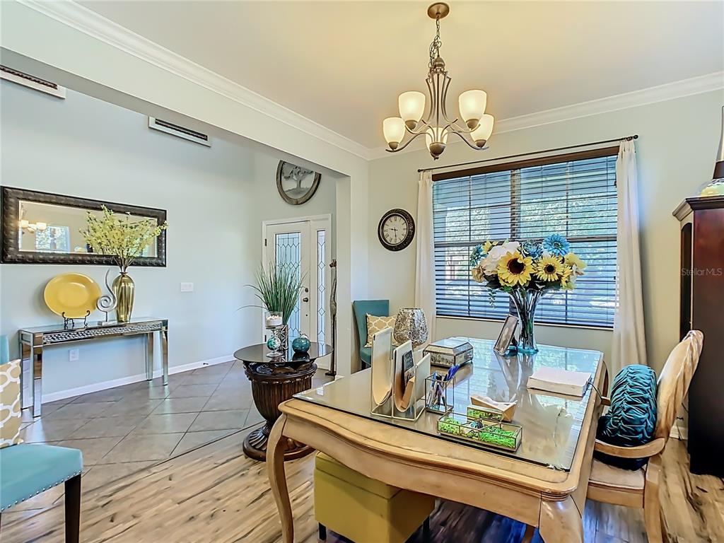 168 Magneta Loop Auburndale, FL 33823 - Photo 5 of 75 a dining room with furniture and window