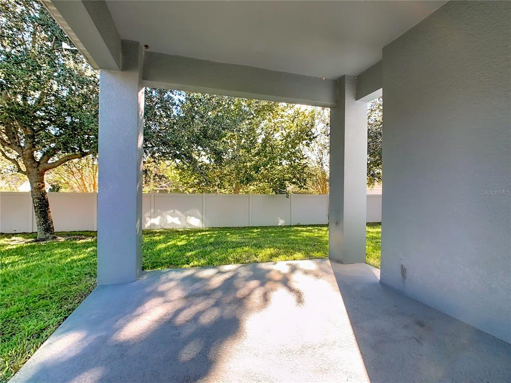 168 Magneta Loop Auburndale, FL 33823 - Photo 54 of 75 a view of a back yard from a room