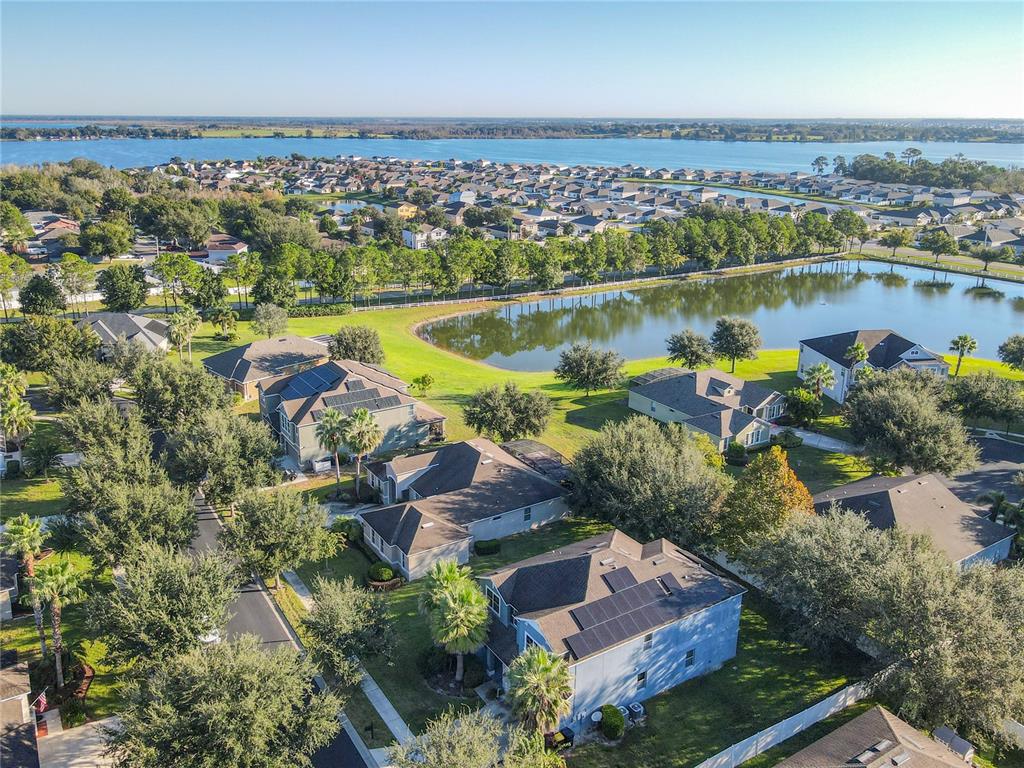 168 Magneta Loop Auburndale, FL 33823 - Photo 61 of 75 an aerial view of residential houses with outdoor space and swimming pool