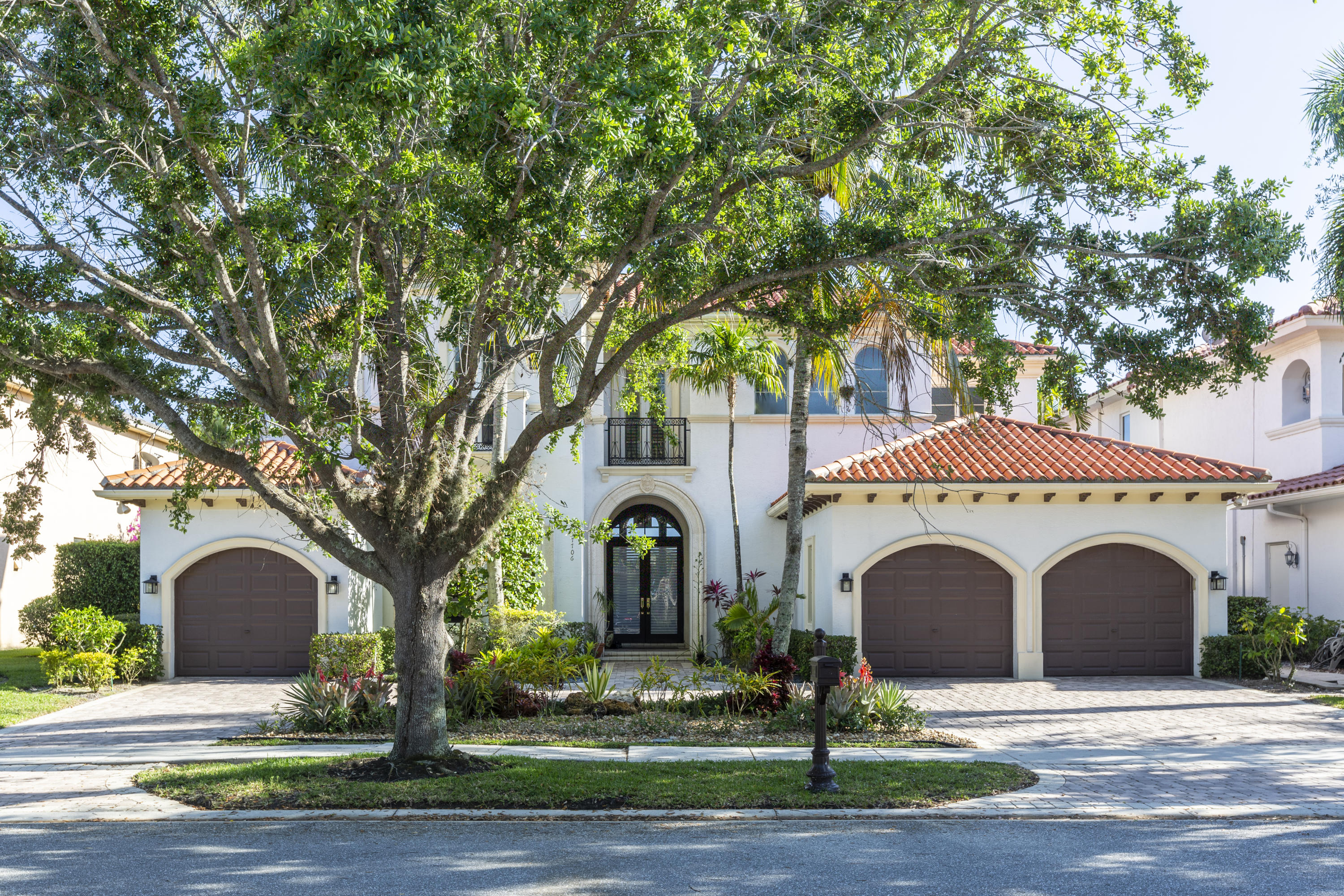 17706 Middlebrook Way Boca Raton, FL 33496 - Photo 2 of 61 a front view of a house with garden