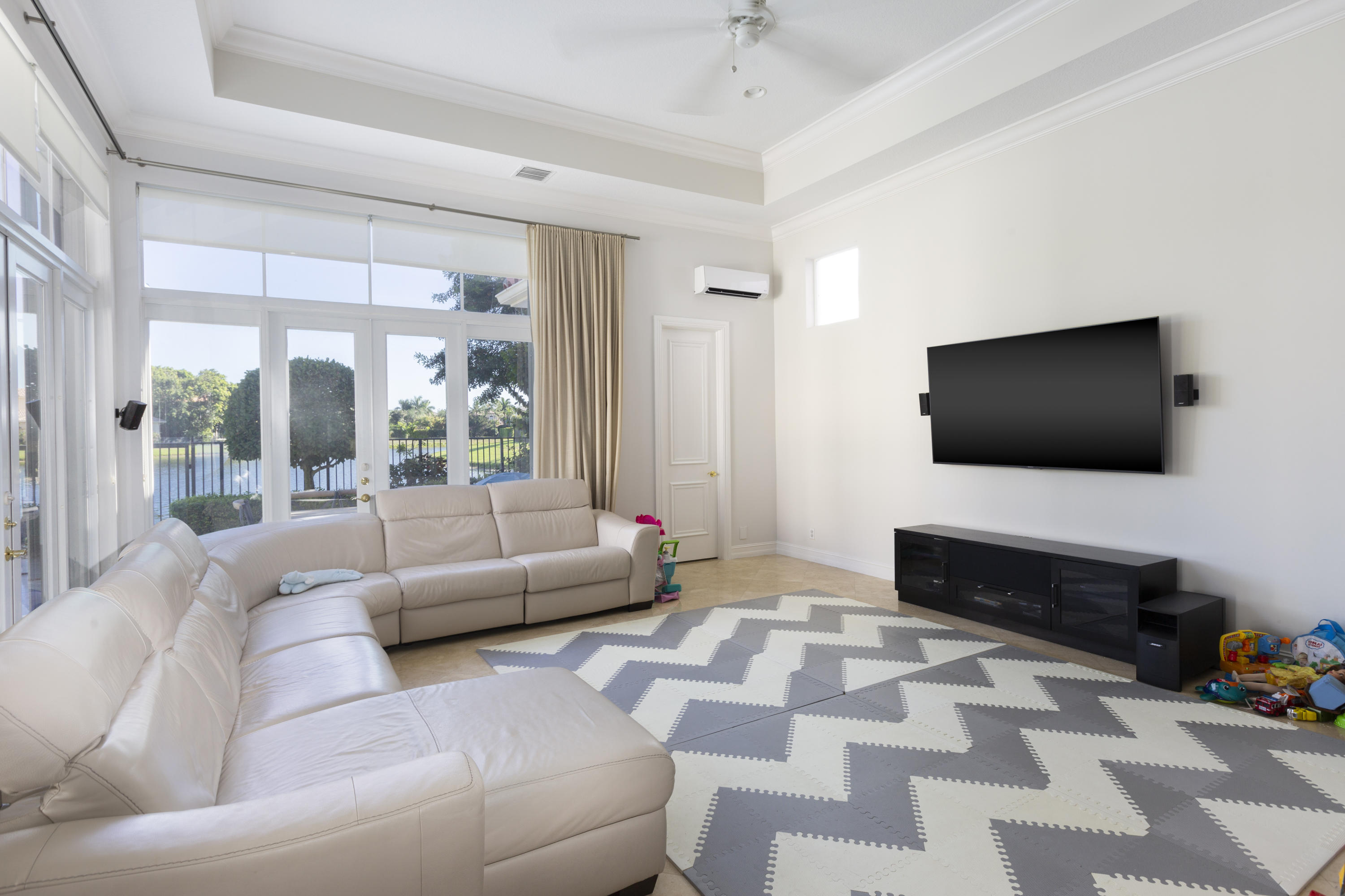 17706 Middlebrook Way Boca Raton, FL 33496 - Photo 22 of 61 a living room with furniture and a flat screen tv