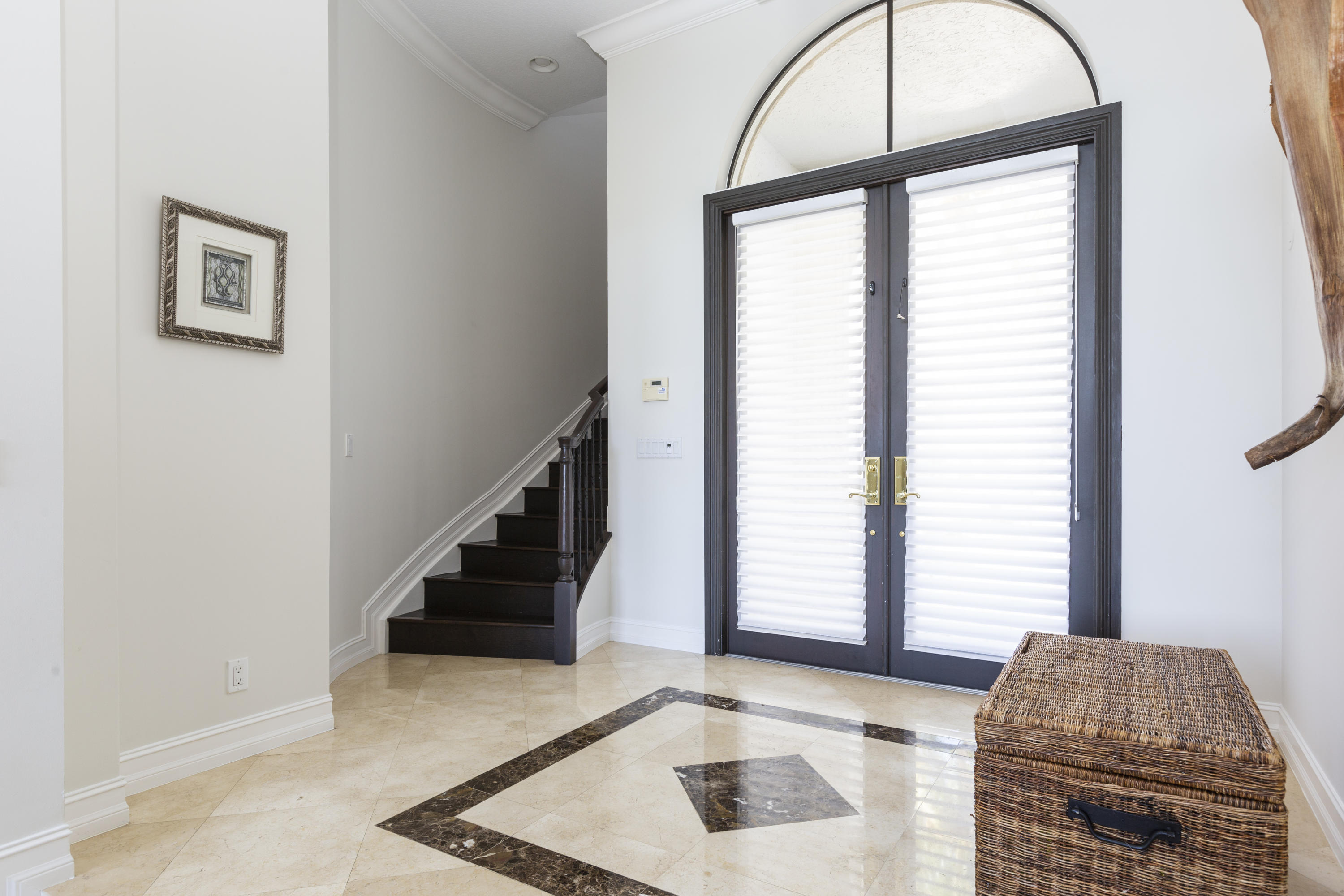 17706 Middlebrook Way Boca Raton, FL 33496 - Photo 26 of 61 a living room with a couch and a large window