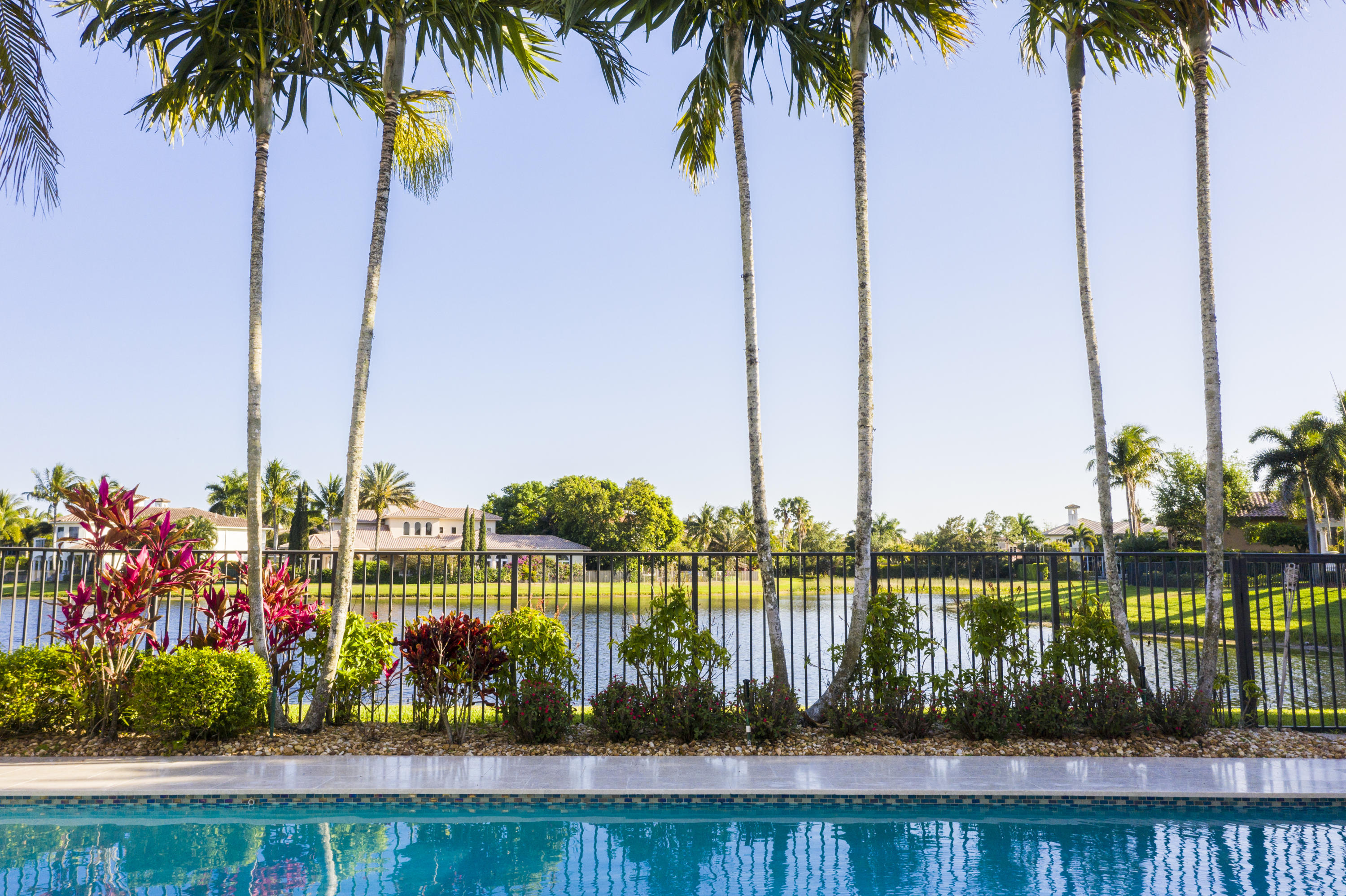 17706 Middlebrook Way Boca Raton, FL 33496 - Photo 9 of 61 a view of a lake with a palm trees