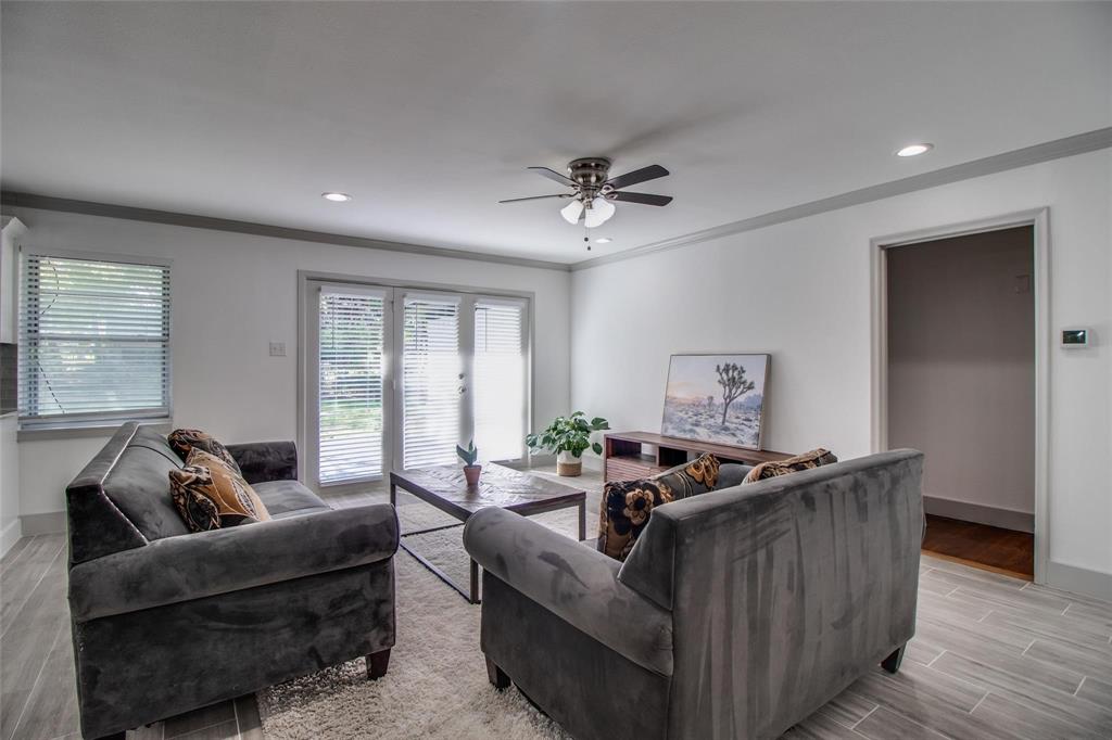 702 Ridgedale Drive Garland, TX 75041 - Photo 3 of 23 a living room with furniture and a window