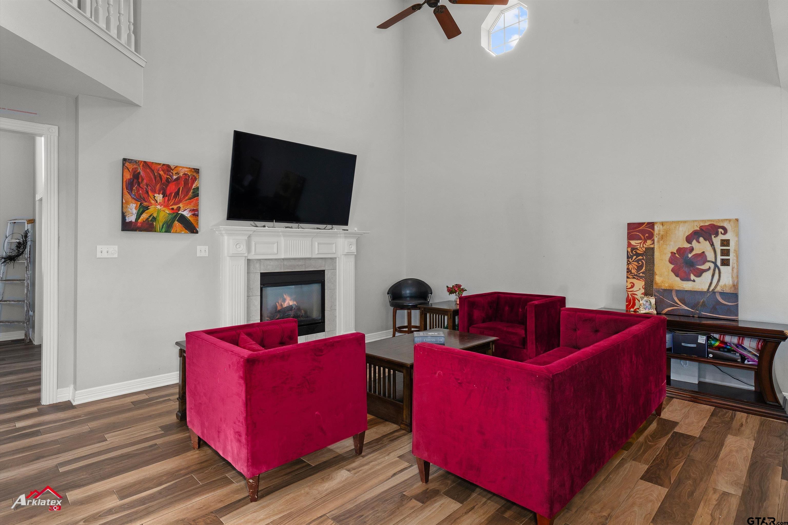 3815 Holly Ridge Drive Longview, TX 75605 - Photo 9 of 22 a living room with furniture and a flat screen tv