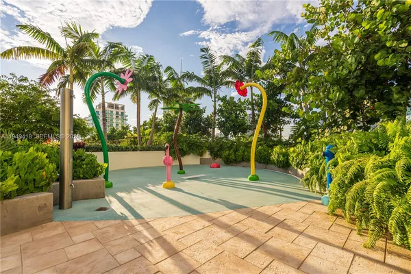 a view of an outdoor sitting area with swimming pool