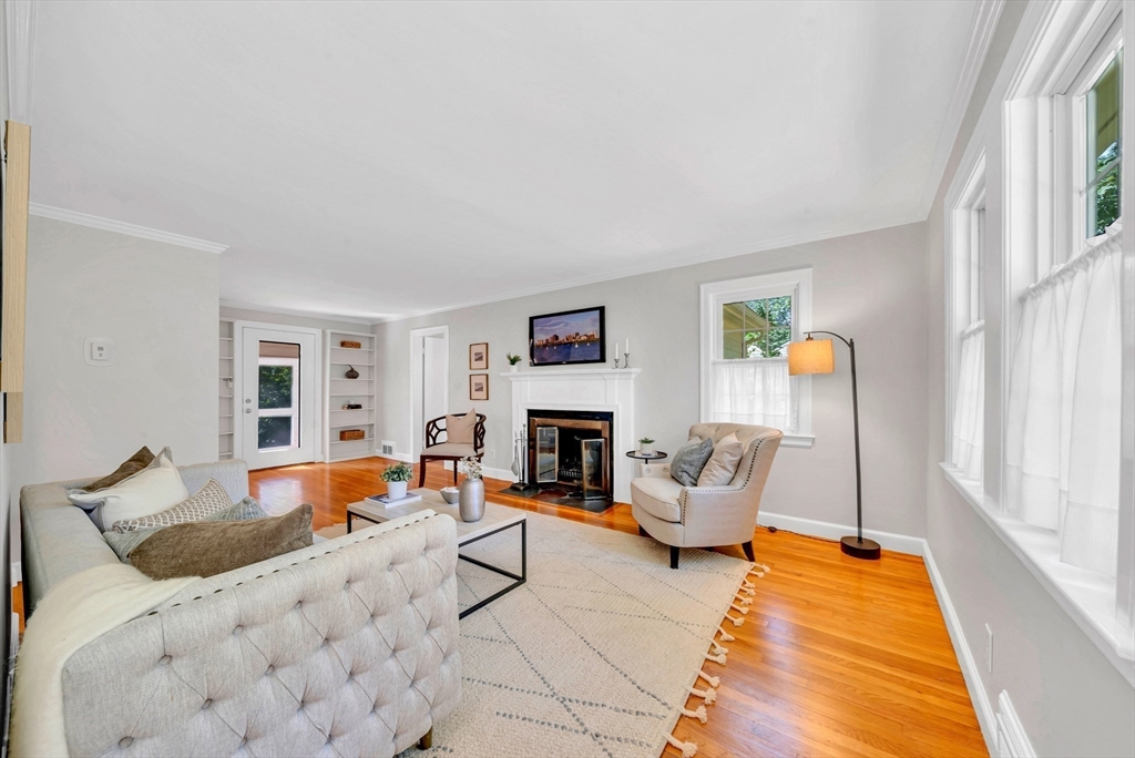 43 Plain Road Wayland, MA 01778 - Photo 6 of 41 a living room with furniture and a fireplace