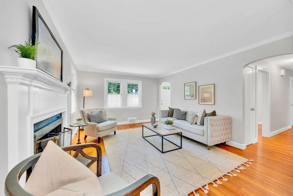 43 Plain Road Wayland, MA 01778 - Photo 8 of 41 a living room with fireplace furniture and a wooden floor