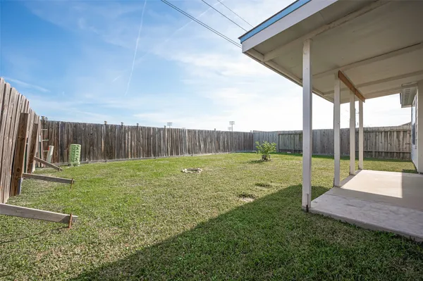 a view of backyard with green space