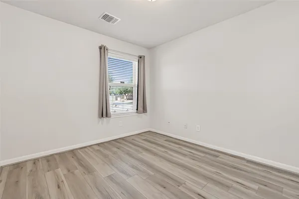 an empty room with a window