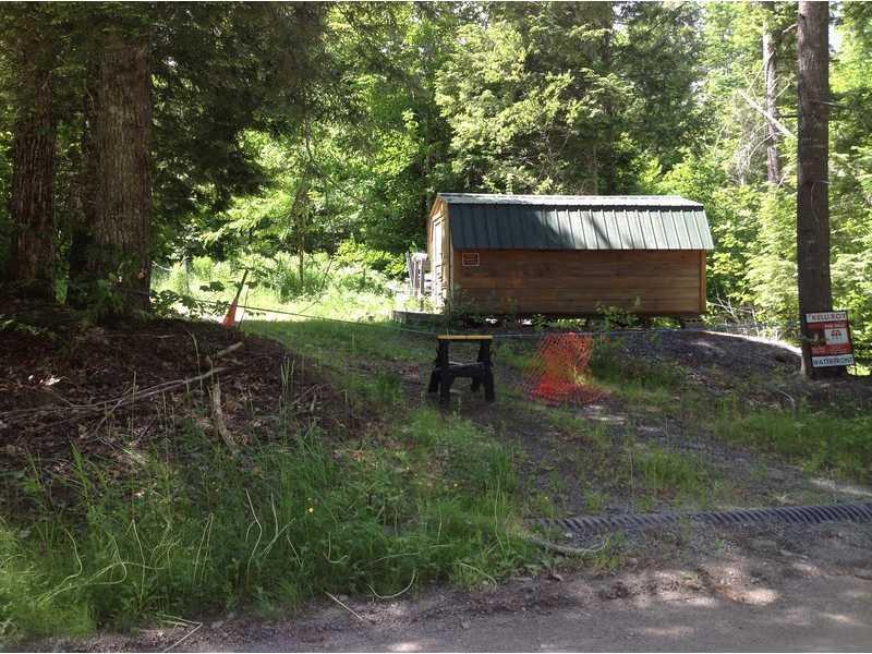 311 West Shore Road Ellsworth, ME 04605 - Photo 17 of 18 Exterior Front. Shed and rest of acreage