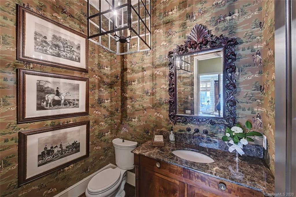 6256 Sharon Hills Road Charlotte, NC 28210 - Photo 16 of 45 a bathroom with a toilet and a sink
