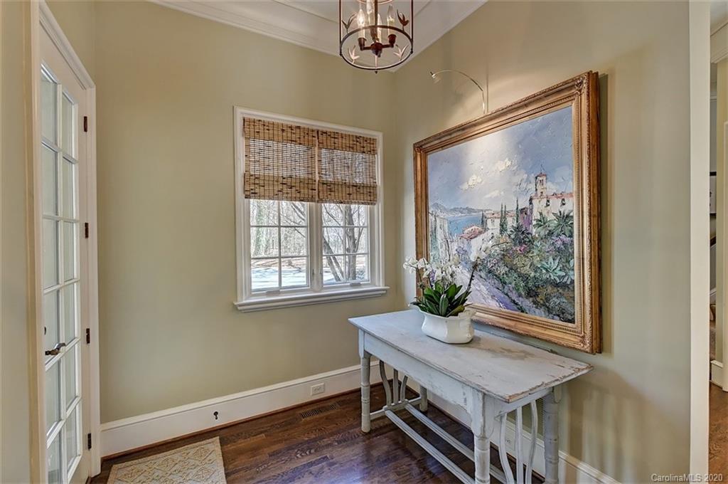 6256 Sharon Hills Road Charlotte, NC 28210 - Photo 17 of 45 a view of a dining room with furniture window and wooden floor