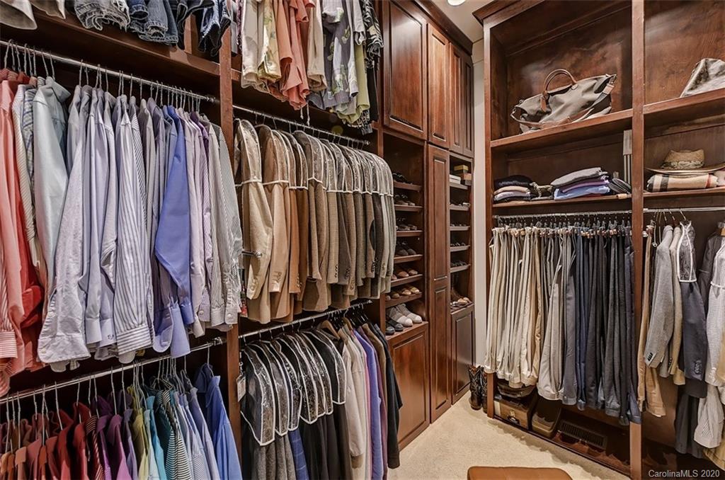 6256 Sharon Hills Road Charlotte, NC 28210 - Photo 23 of 45 a view of walk in closet with clothes and shoes