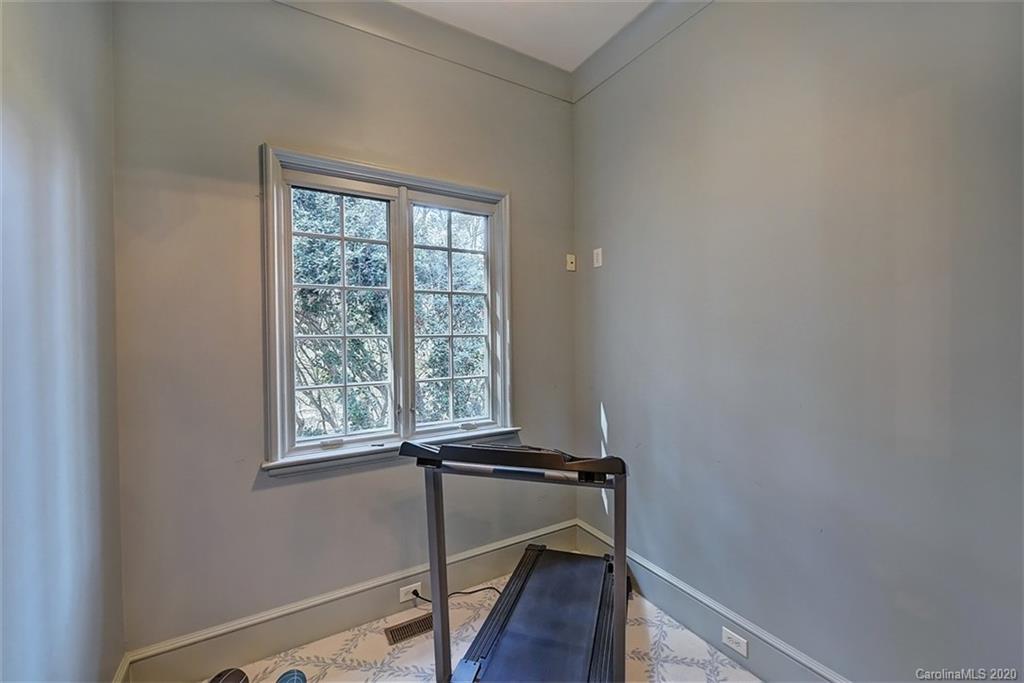6256 Sharon Hills Road Charlotte, NC 28210 - Photo 25 of 45 a room with a window and a mirror