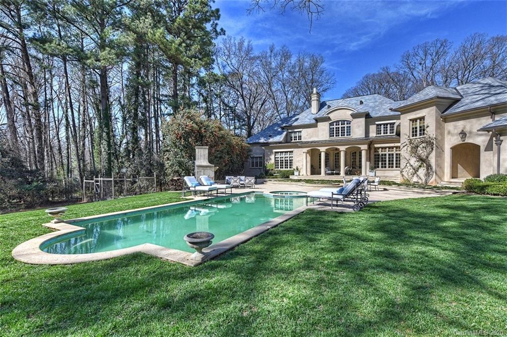6256 Sharon Hills Road Charlotte, NC 28210 - Photo 41 of 45 a swimming pool with outdoor seating and yard